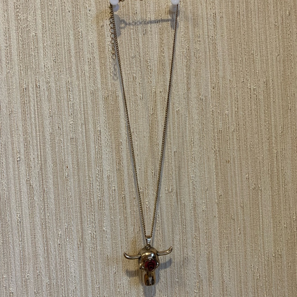 gorgeous, bull necklace, gold with pink floral design 🌸🐂